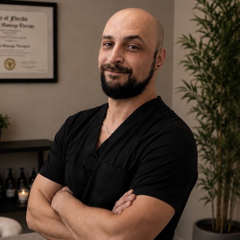 Portrait of Benjamin Rosendahl in black scrubs